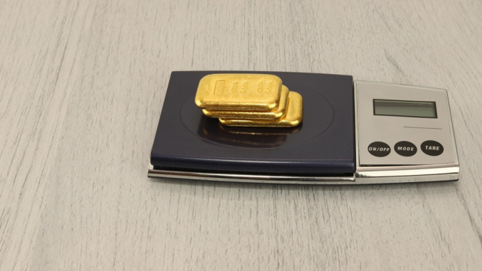 On,The,Electronic,Scales,Are,Gold,Bars.,100,Gram,Ingots,